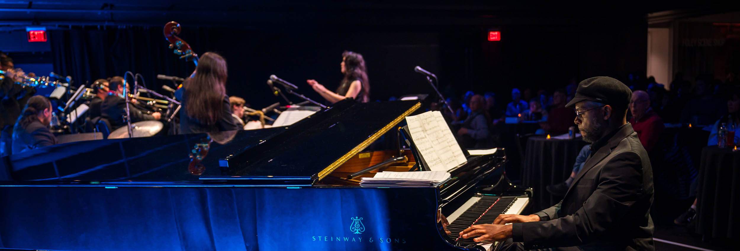 a pianist performing with the julia keefe indigenous big band