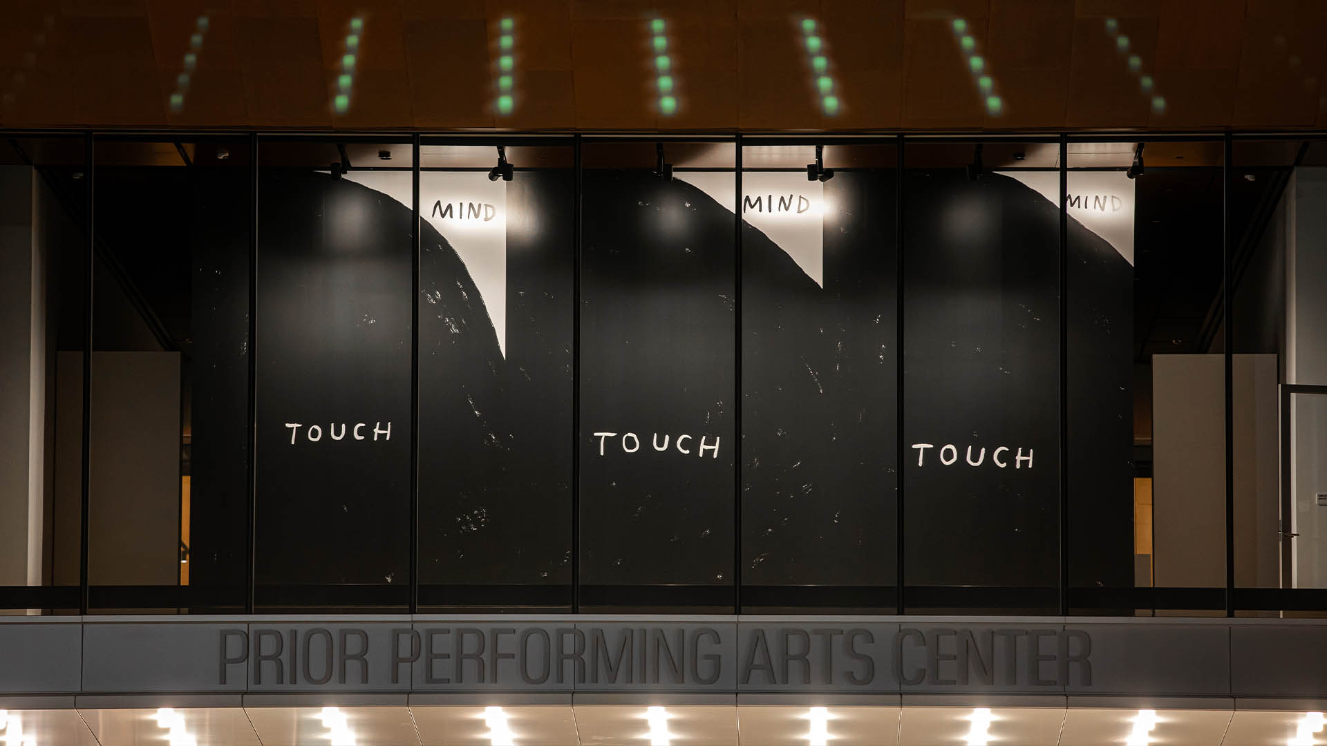 Mural by Christine Sun Kim in the Cantor Art Gallery window