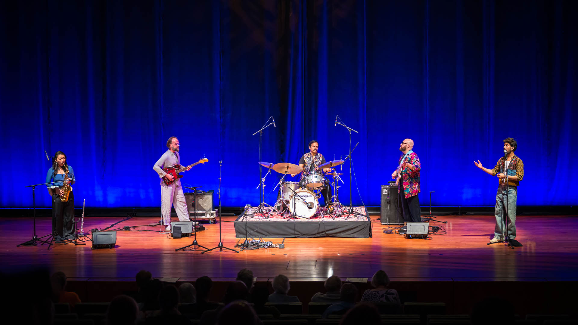 Sunny Jain and his band performing "Wild Wild East"