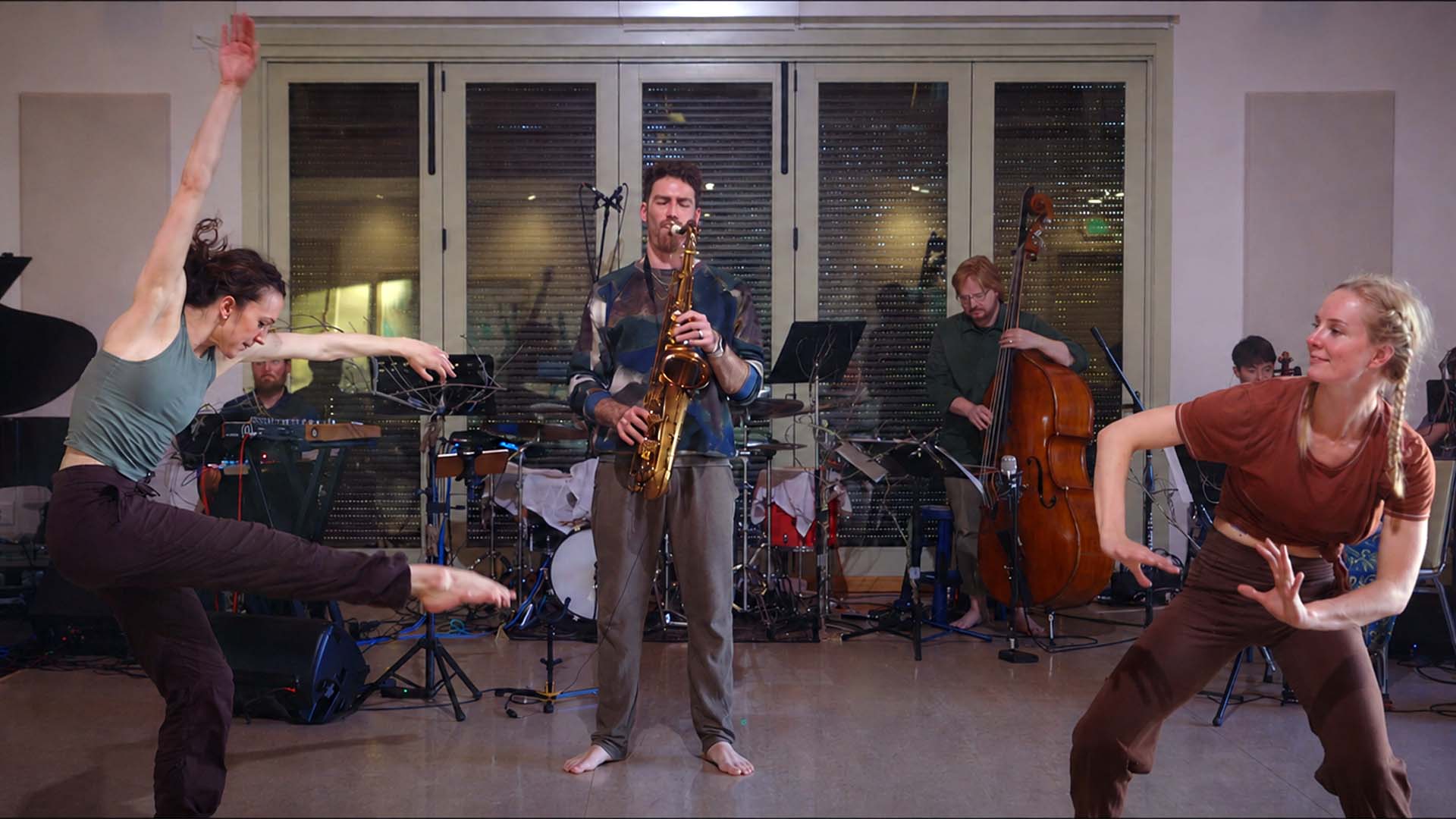 dancers and musicians in the From The Ashes ensemble